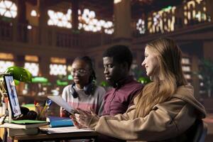 Pupils attend a conference class lesson in a library for medical science and microbiology, combining remote technology and academic resources to prepare for exams. Diploma in medicine. photo
