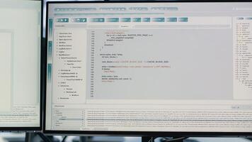 Computers in data center running server rigs diagnostic tests and error checking utilities to identify and resolve software problems. PC software used to monitor critical systems, checking for issues photo