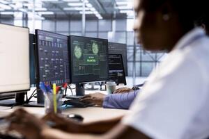 Computer scientist receives access granted notification while reconfiguring server hub, optimizing it. IT expert ensures data center workplace operates efficiently, successfully eliminating all errors photo