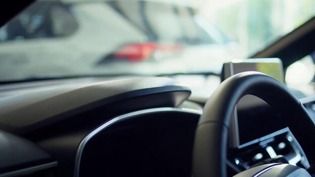 Close up shot of person closing car after using lock controls on panel to unlock it. Automobile owner pulling door handle after using buttons to disengage mechanism latch photo