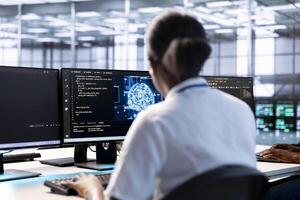 Server hub IT expert using AI systems to input data faster during complex computational tasks. African american woman in data center using artificial intelligence parallel processing tech photo