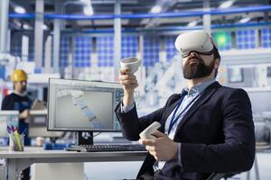 Photovoltaics factory worker using VR technology to analyze and modify assembly line configurations. Solar panels plant expert using virtual reality to do system performance optimizations photo
