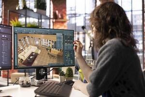 Home design professional uses architectural software to develop a floor plan, digital tool offers an intuitive interface for rendering apartment interiors with precise furniture placement. photo