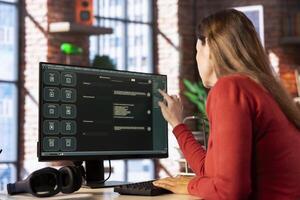 Freelancer woman utilizing AI powered software to improve productivity at home office, remote work. Virtual assistant showcases how automation and machine learning transform daily tasks. photo