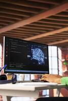 Admin doing maintenance on artificial intelligence neural networks computerized model, solving tasks on PC. Close up of man working in tech support doing checkup on AI systems photo