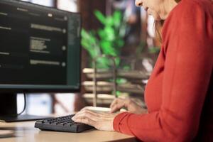 PC user interacting with an AI chat system on her computer at home office, highlighting the evolution of artificial intelligence. Woman employs chatbot services and digital tools for productivity. photo