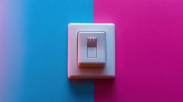White light switch on blue and pink background. photo