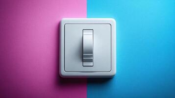 White dimmer switch on pink and blue background. photo