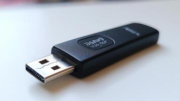Close-up of a black USB-C flash drive on a white surface. photo