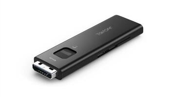 Black USB-C dongle with slots. photo