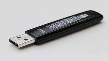 Black USB flash drive on white background. photo
