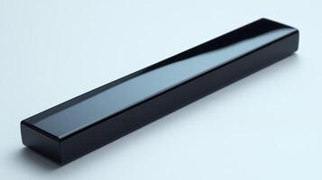 Sleek black rectangular object on white background. photo