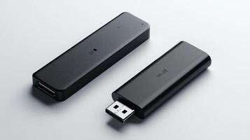 Two black USB devices on white background. photo