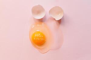 Fresh broken chicken egg with eggshell photo