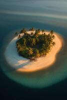 An island surrounded by palm trees in the middle of the ocean photo