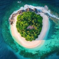 Aerial view of tropical island in the ocean with green vegetation photo