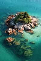 A small island in the middle of the ocean photo