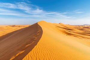 Desert landscape with sand dunes and blue sky in sahara desert, morocco photo