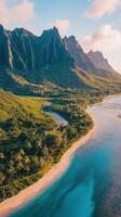 The beautiful beach and mountains of kauai island in hawaii photo