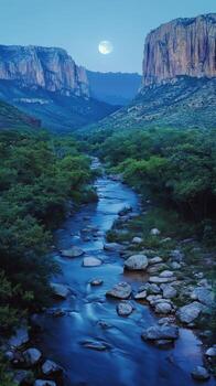 A river flowing through a canyon with rocks and trees photo