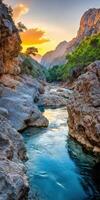 River at sunset in the mountains of oman photo