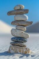 A stack of stones in the sand photo