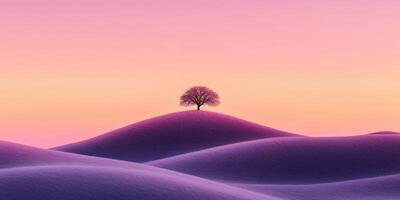 A lone tree stands on top of a hill in the middle of a purple sunset photo