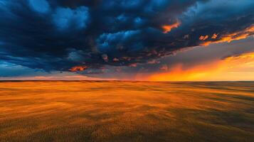 A stormy sky over a field with a rainbow photo