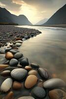 A river with rocks and water in the foreground photo