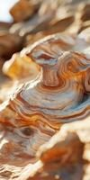 A close up of a rock with a wavy pattern photo