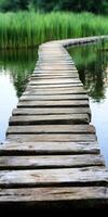 A wooden walkway over a lake photo