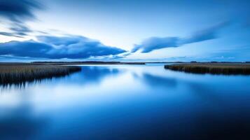 A long exposure photograph of a body of water photo
