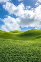 A green field with hills and clouds photo