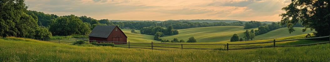 A red barn sits on a green hillside photo