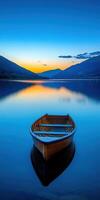 A rowboat sits on the water at sunset photo