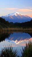 Mountains glow in water photo