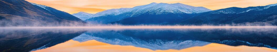 Calm lake mirrors mountains photo