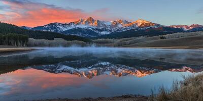 Sunrise over valley lake photo