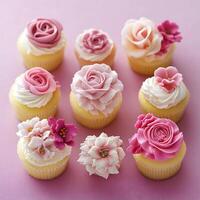 Cupcakes decorated with pink rose flowers on a pink background, square image. Macro close up, selective focus. photo