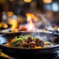 Beef stew with vegetables and herbs in a wok. Selective focus. photo
