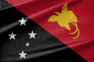 Papua New Guinea National Flag Waving in the Wind photo