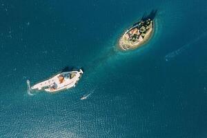 Island of Gospa od Skrpjela is opposite the island of St. George in the Bay of Kotor. Top view photo