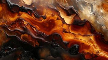 Abstract molten design features layered texture dynamic swirls and rich warm color transitions from deep black to bright gold photo