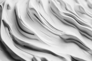 An abstract gray texture background featuring a smooth, wavy pattern in a modern style. photo