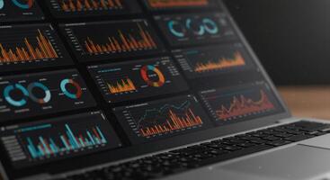 Close-up of a laptop screen showcasing data charts and graphs for business analytics, providing insights. photo