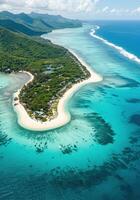 Aerial view captures a tropical island's pristine beaches and turquoise waters on a sunny day. photo