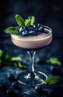 Refreshing Blueberry Mint Cocktail in Elegant Glass with Garnish photo