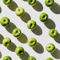 Fresh green apples arranged in a pattern photo