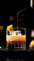 Refreshing Cocktail with a Splash of Lemon and Ice in a Dark Atmosphere photo