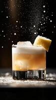 Refreshing cocktail served with a lemon slice and ice on a dark background photo